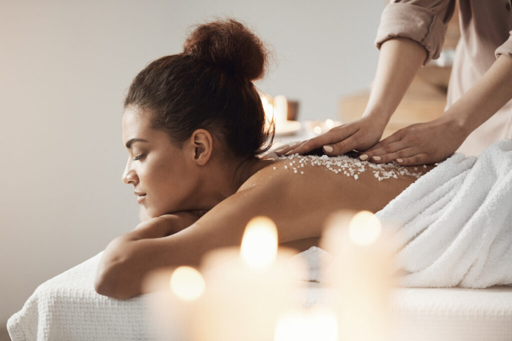 beautiful-african-woman-resting-enjoying-spa-health-massage-with-sea-salt